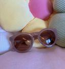 Lunettes de soleil rose clair forme ronde