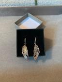 Boucles d'oreilles plumes pendantes en argent