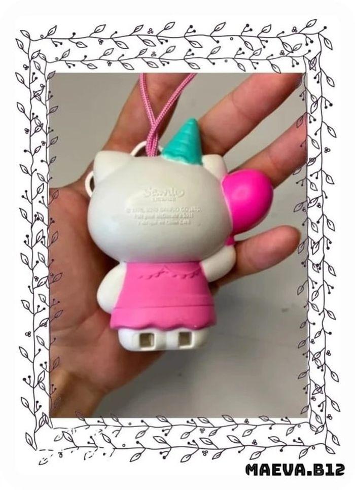 Gros porte clés / Figurine Hello Kitty McDonald's 2015 avec cadeau dedans - photo numéro 4