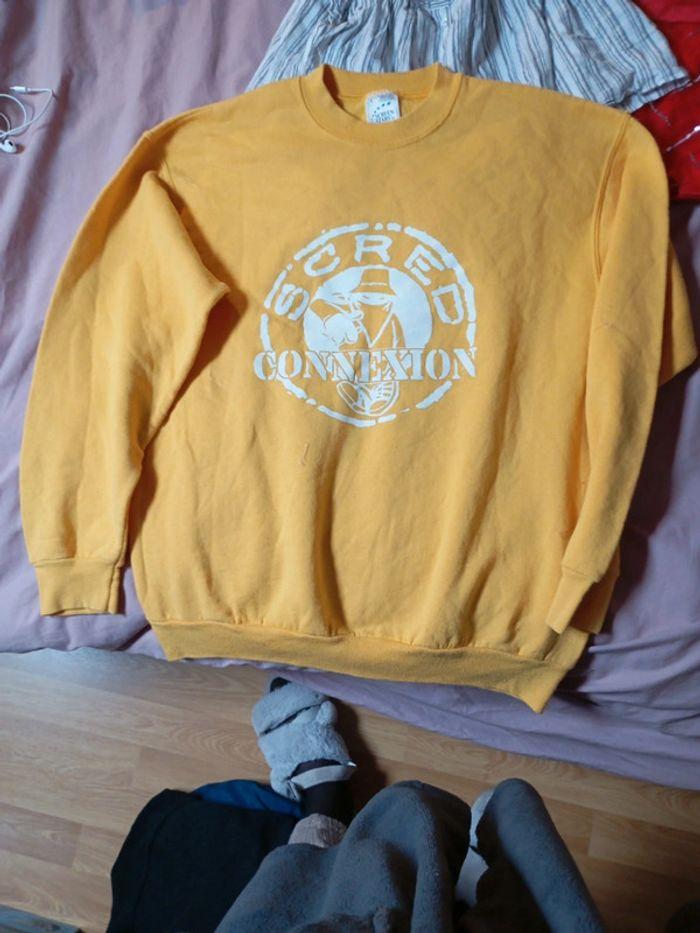 Sweat star jaune neuf L