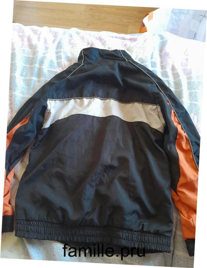 Veste de de sport/coupe vent 8 ans - photo numéro 4