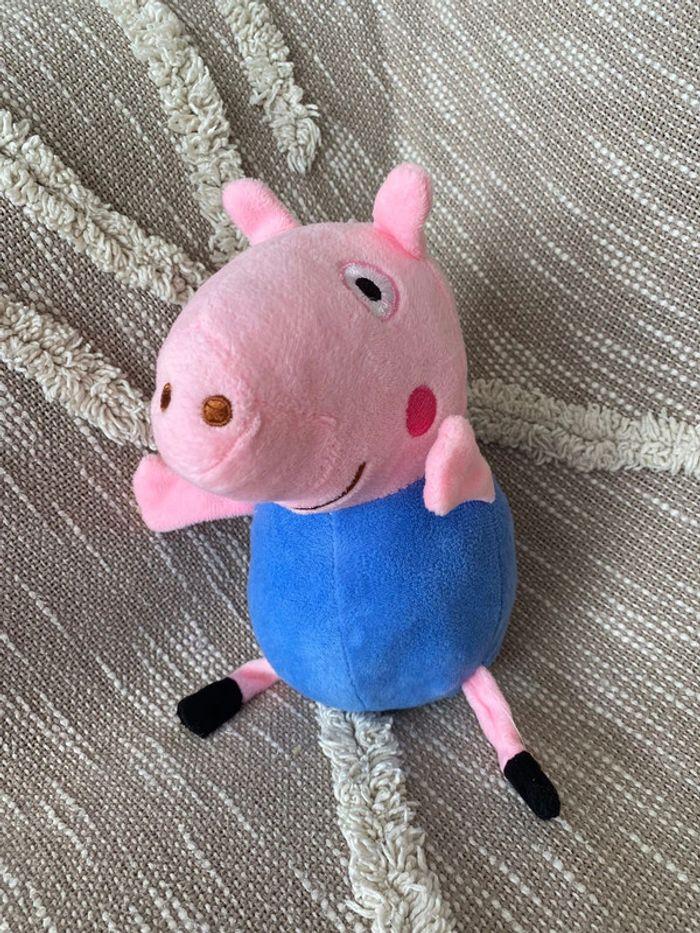 Peluche doudou 21cm Peppa Pig george petit frère cochon rose et bleu très bon état - photo numéro 1