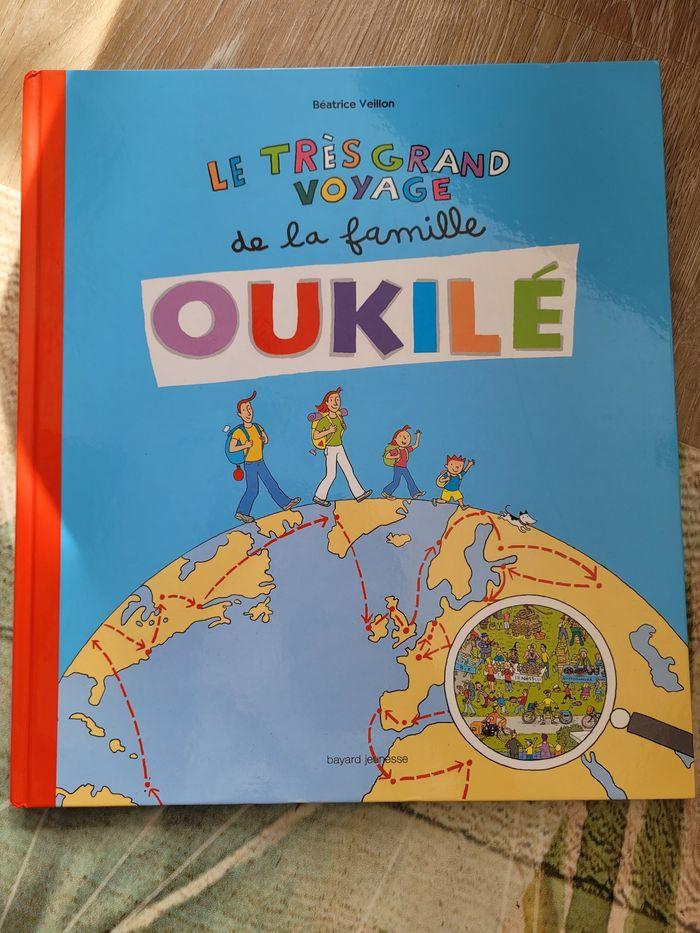 Livre cherche et trouve Le très grand voyage de la famille Oukilé - photo numéro 1