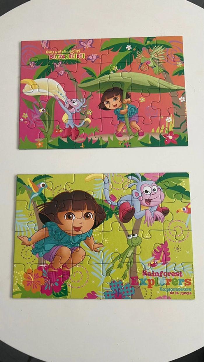 Puzzle dora l’exploratrice 2x24 pièces 4 ans été plus parfait état - photo numéro 1