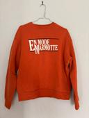 Pull orange « En mode marmotte »