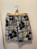 Short de bain noir à fleurs XXL