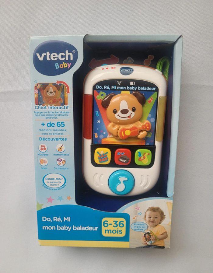 NEUF - Do Ré Mi mon baby baladeur 6-36 mois Vtech baby - photo numéro 1