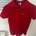 Polo Lacoste rouge taille 10 ans parfait état