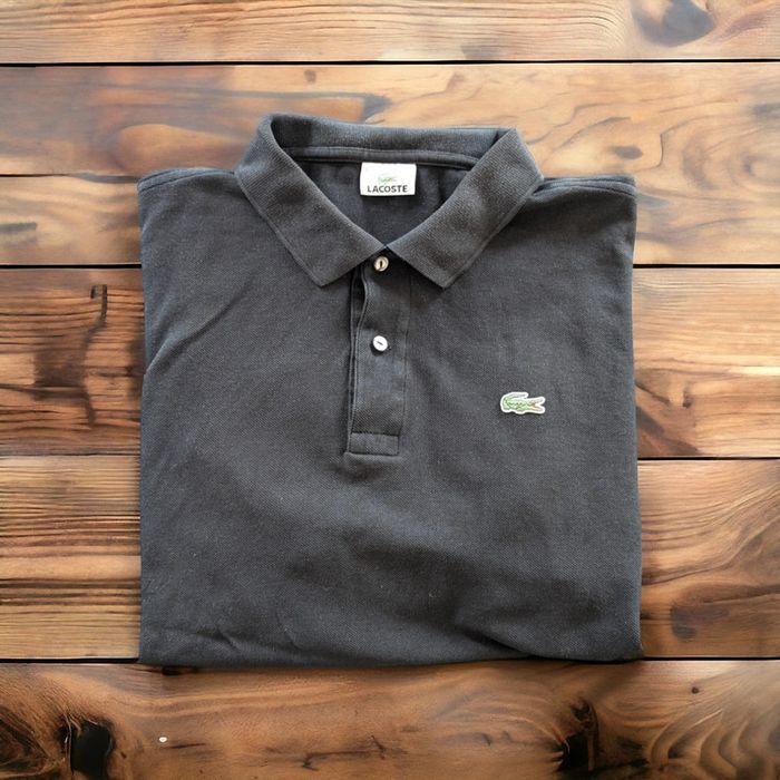 Polo Lacoste noir - Taille 6 (XL) - Excellent état - photo numéro 1