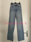 Jean bleu clair taille haute coupe straight flare jambe large effet déchiré stradivarius taille 32