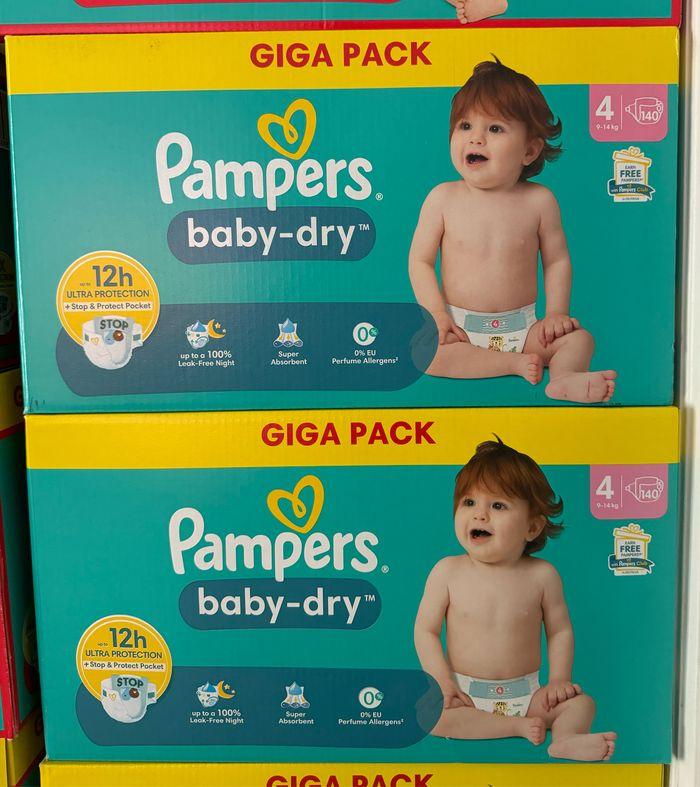 2 paquets de couches Pampers taille 4