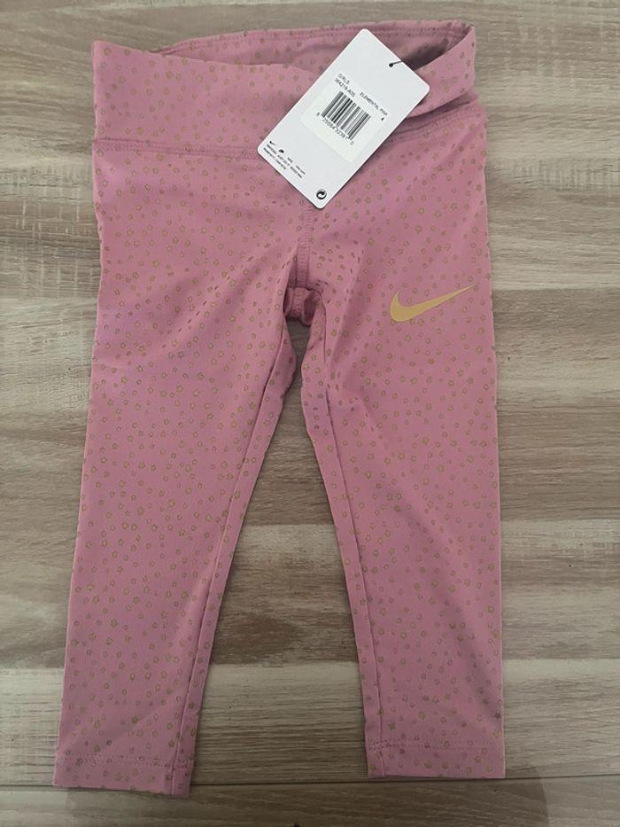 Legging de sport Nike rose et or - photo numéro 1