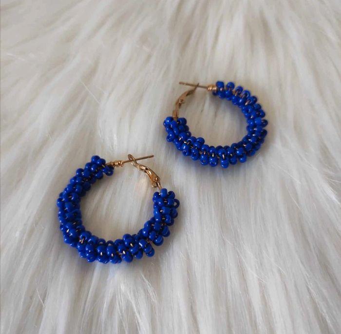 Boucle d'oreille 💙 - photo numéro 1