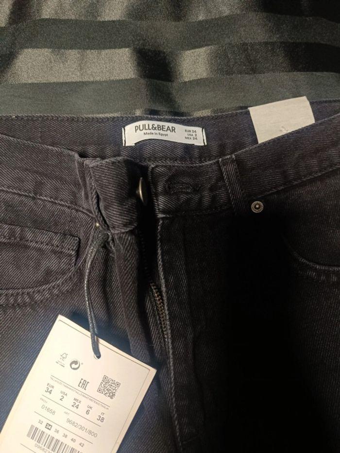 Vente jean noir large en bas- taille 34-neuf - photo numéro 3