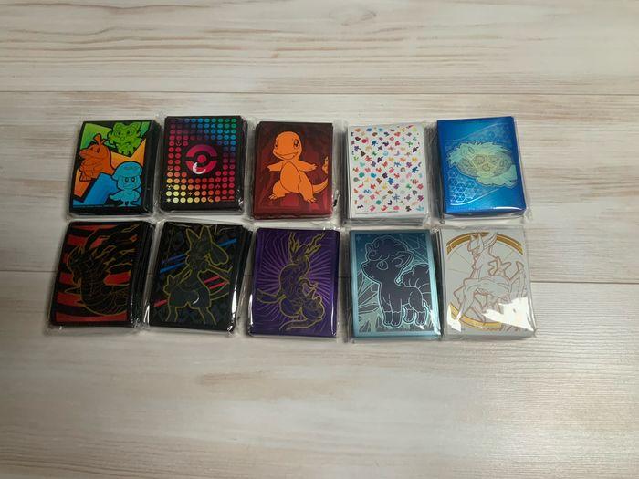 Lot de 10 paquets de sleeves pokemon différents