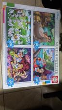 4 puzzles Disney en 1