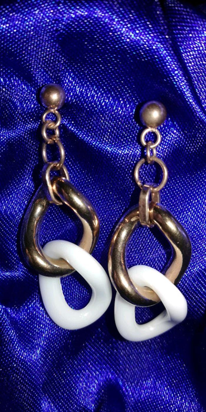 Boucles d'oreilles en acier - photo numéro 3