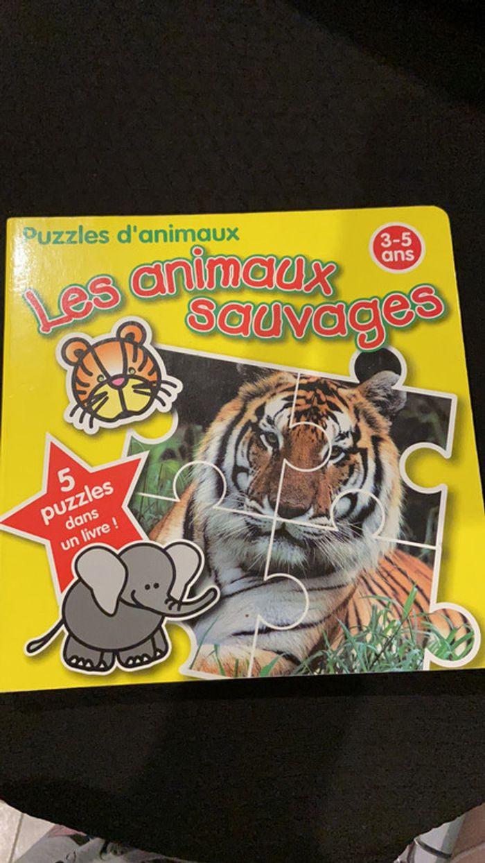 Livre puzzle Les animaux sauvages - photo numéro 1