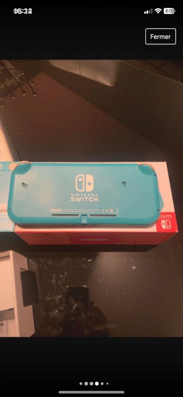 Switch lite original+jeux+rangement - photo numéro 4