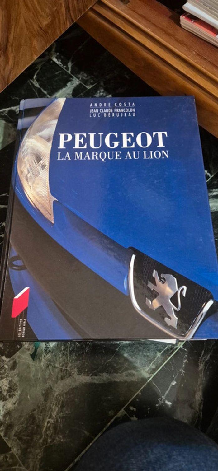 Livre peugeot la marque au lion