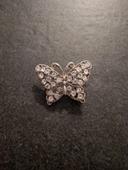 Broche strass papillon