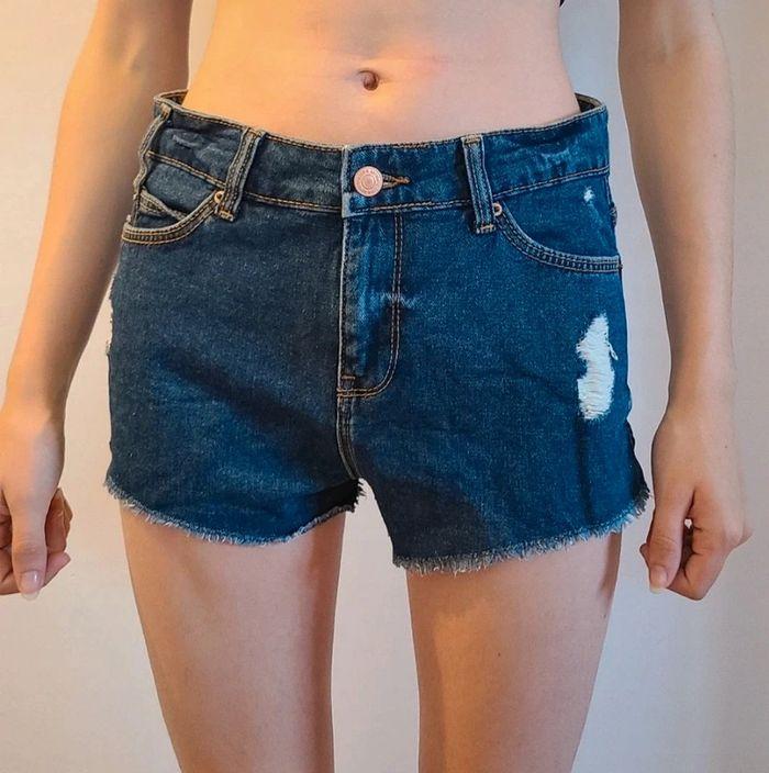 Short jeans bleu troué 34 jennyfer - photo numéro 1