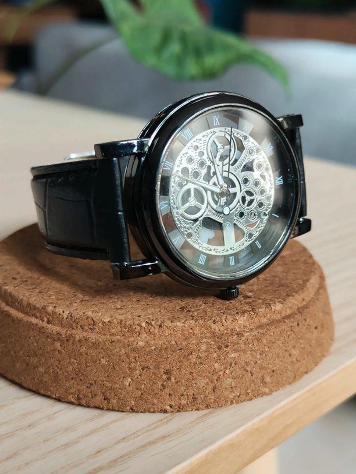 Montre noire transparente, mécanique argentée - photo numéro 1