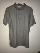 Polo Calvin Klein taille L gris