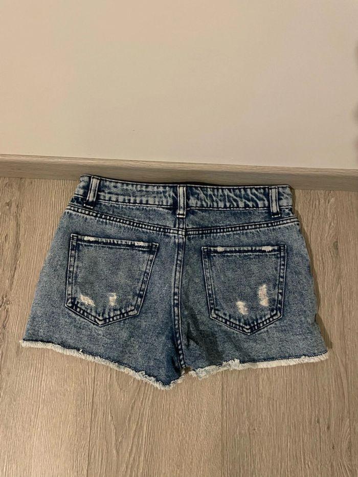 Short en jean bleu taille haute effet déchiré kiabi taille 34 - photo numéro 4