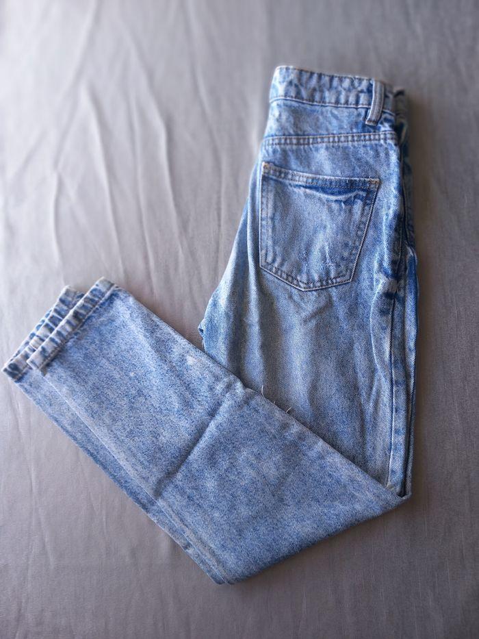 Jeans troué - photo numéro 2