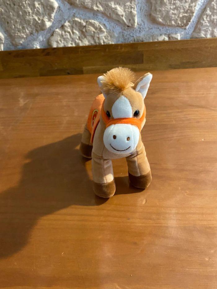 Petite peluche cheval qui fait du bruit - photo numéro 2