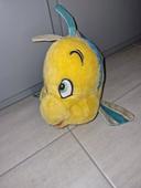 Peluche polochon disney