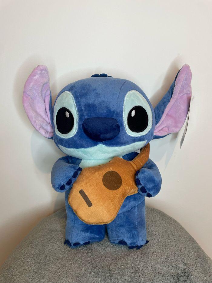 Peluche Disney Stitch avec ça guitare - photo numéro 7