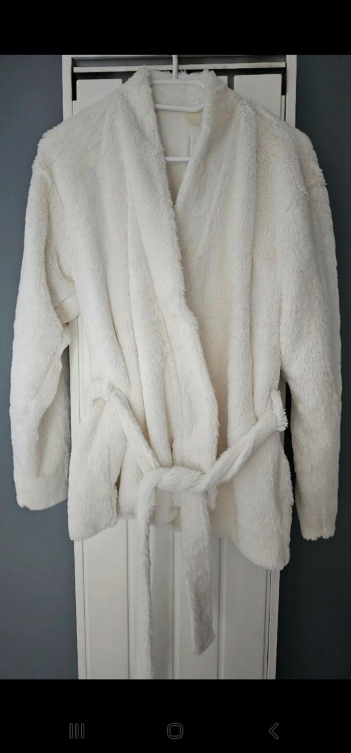 Veste moumoute blanche