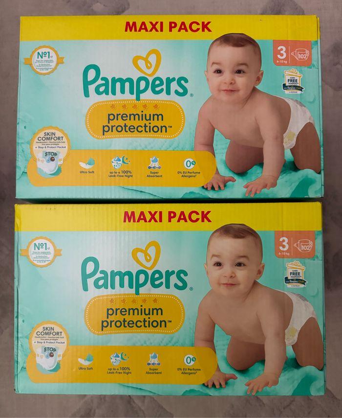 2 paquets de couches Pampers taille 3