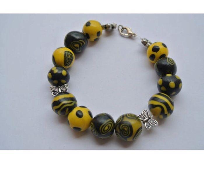 Bracelet jaune et noir - photo numéro 1