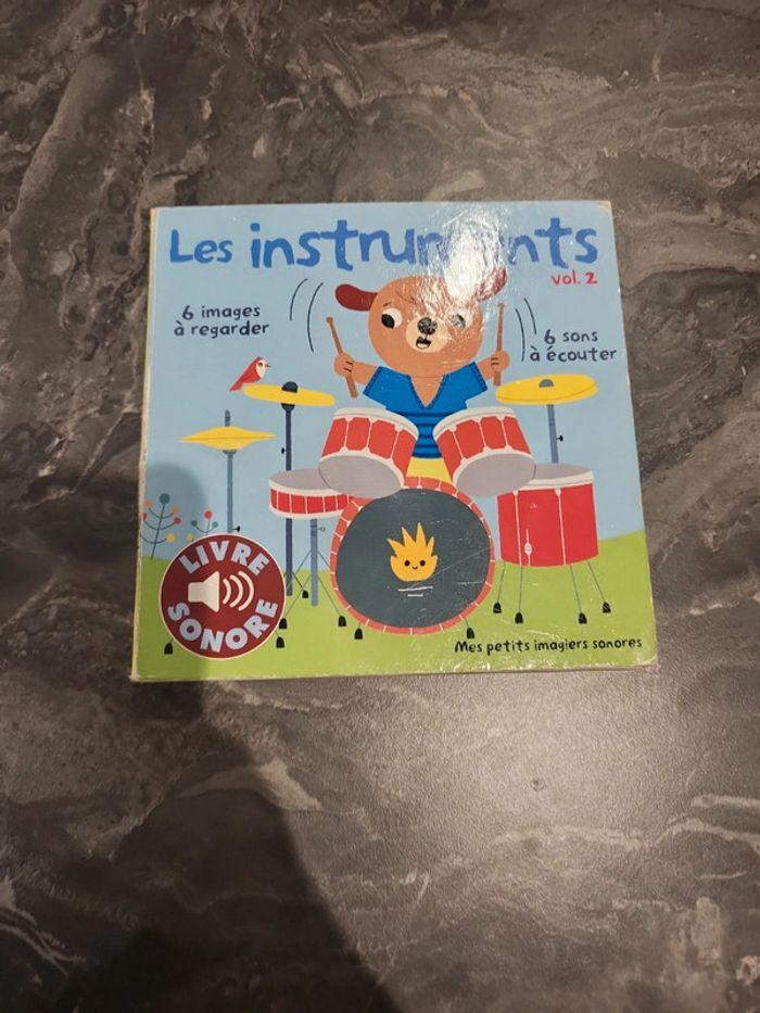 Livre sonore les instruments ,les piles sont à changer - photo numéro 1