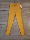 Très beau pantalon stretch fille jaune neuf 10 ans Italy Moda