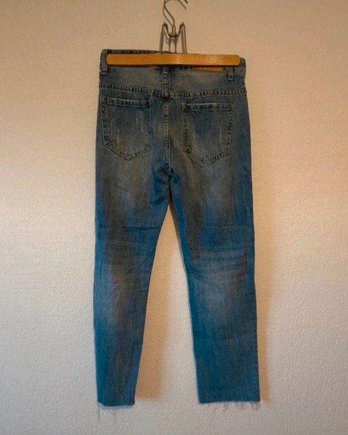 Jeans troués - photo numéro 3