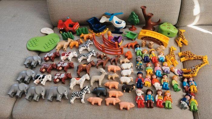 Lot de 84 pièces Playmobil Primo personnages animaux véhicules - photo numéro 1