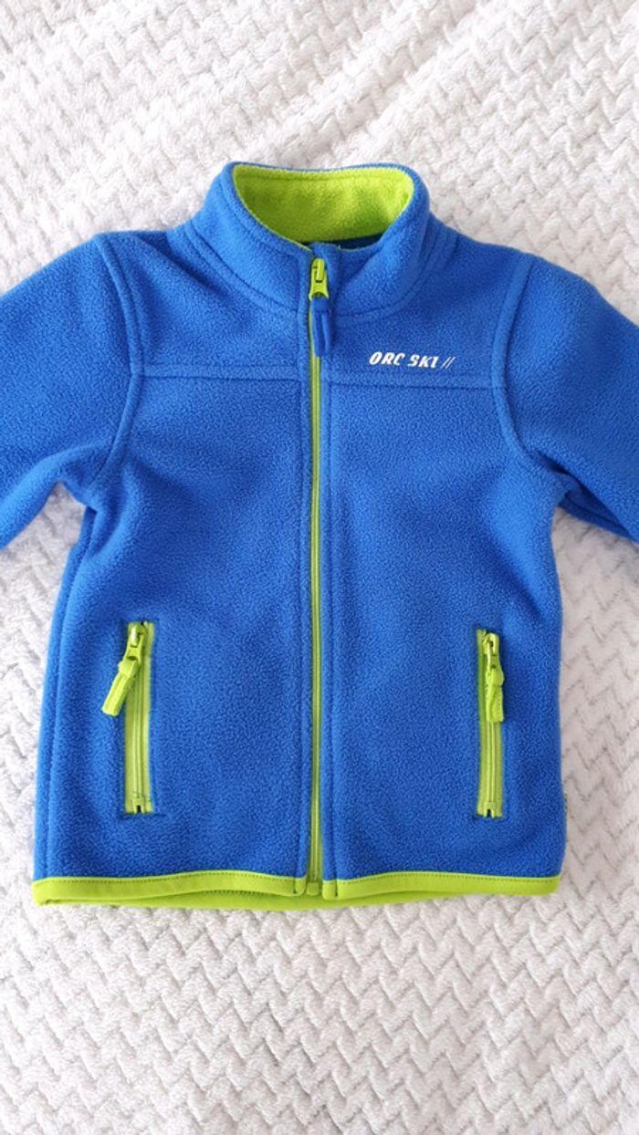 Gilet zippé polaire bleu et vert fluo Orchestra 6 mois comme neuf - photo numéro 2