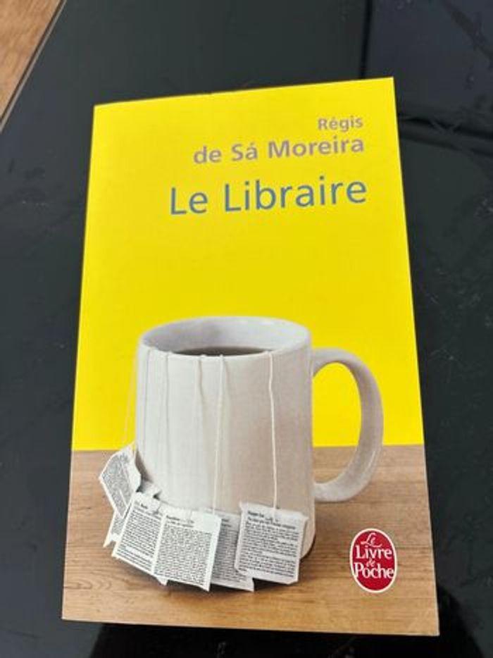 Le libraire / Régis De Sá Moreira - photo numéro 1