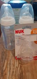 Biberon nuk 300ml plus 2 tétines taille L , lait epaissi et 2 tailles M