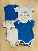 Lot de 4 bodies manches courtes plusieurs marques taille 3 mois