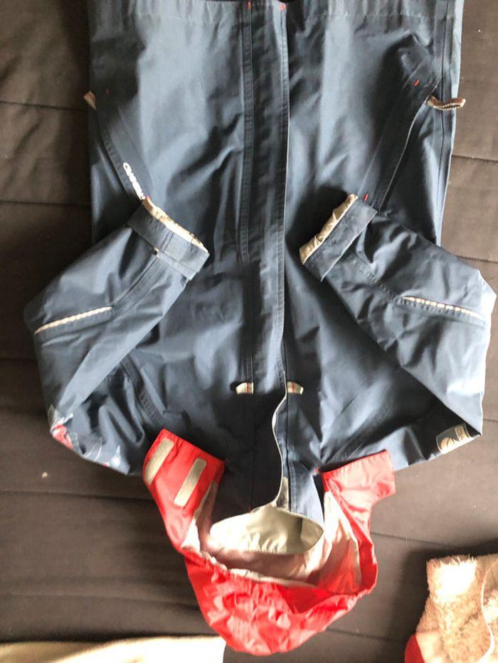 Imperméable Tribord rouge gris  et bleu taille 10 ans