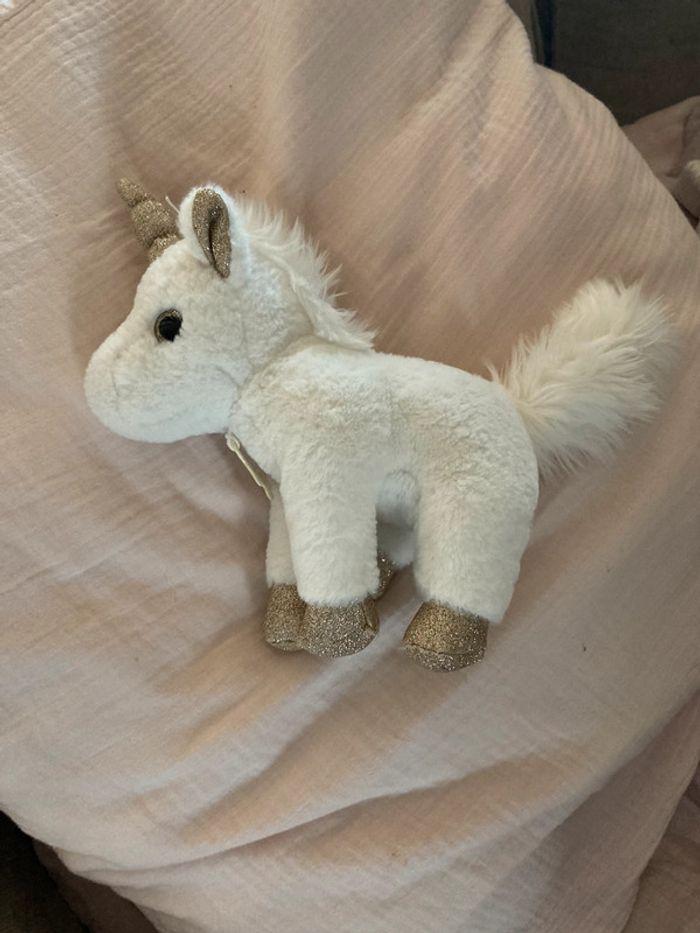 Histoire D’Ours peluche licorne blanche et dorée - photo numéro 3