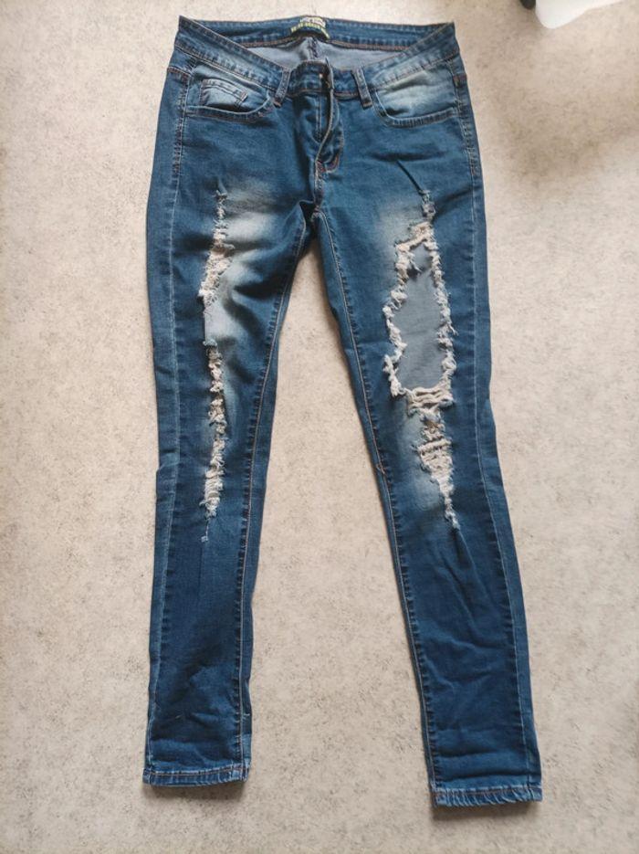 Jeans femme troué