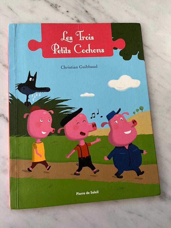 Puzzle et livre les 3 petits cochons 16 pièces - photo numéro 3