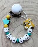 Attache tétine roi lion Simba  jaune turquoise