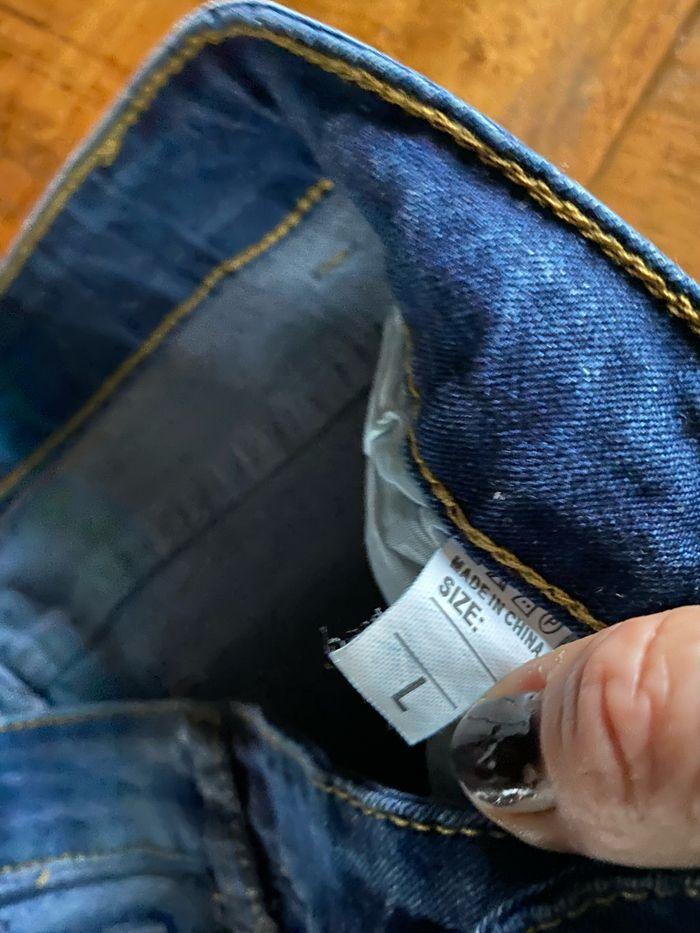 Jeans troué - photo numéro 6